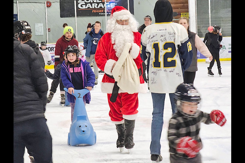 Skaters crowded on to the ice at George Preston for a skate with Santa on Sunday, Dec. 3, organized by Langley Minor Hockey Association for members. (Dan Ferguson/Langley Advance Times) 