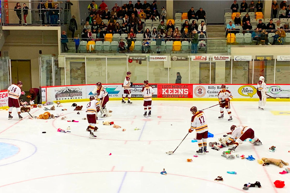 Toys and other Christmas items were flung from the stands to the ice as soon as the Quesnel Kangaroos scored their first goal of the annual Teddy Bear Toss game, held on Dec. 2, for the benefit of local charities. (Tracey Roberts photo - Quesnel Cariboo Observer) 