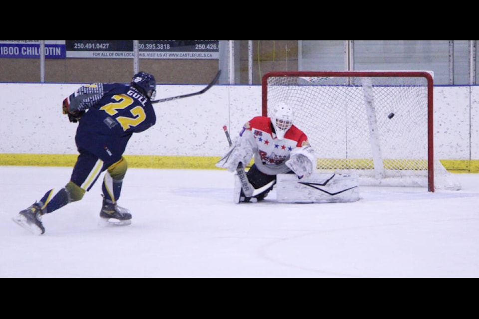 100 Mile House Wrangler Zachary Gull scores a goal during an overtime shootout against the Golden Rockets. (Patrick Davies photo - 100 Mile Free Press) 