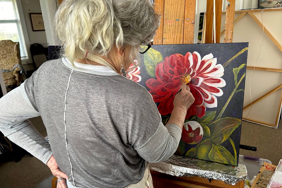 Pat Scott has sold countless paintings throughout the past few decades, sending 50 per cent of each sale to Haiti to help the less fortunate. (Terry Scott/Special to The News) 