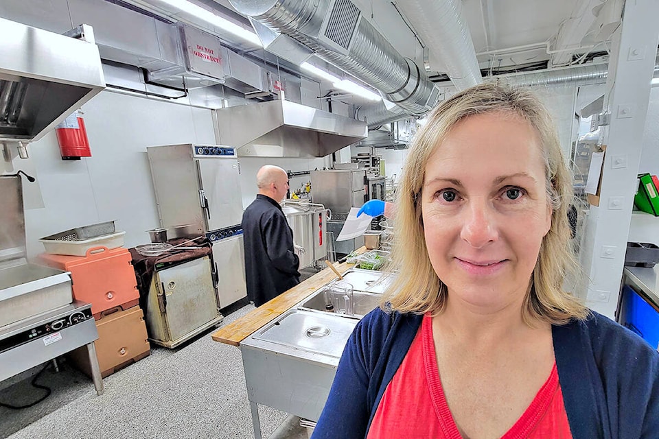 91ԭ Meals On Wheels Executive Director Shannon Woykin, in the kitchen that will prepare Christmas meals for clients who would otherwise be home alone on Dec. 25. (91ԭ Advance Times files) 