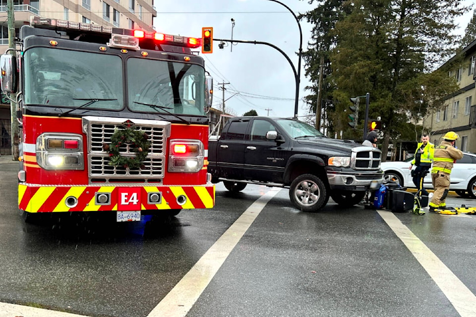A person on a motorized mobility scooter was struck by a pickup truck in downtown Maple Ridge on the morning of Dec. 9. (Brandon Tucker/The News) 