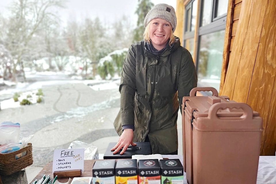 Carolyn Essaunce, chair of the 91ԭ Community Farmers Market, was in charge of hot chocolate at the very first Christmas sale by the market on Saturday, Dec. 9. at Derek Doubleday Arboretum. (Dan Ferguson/91ԭ Advance Times) 