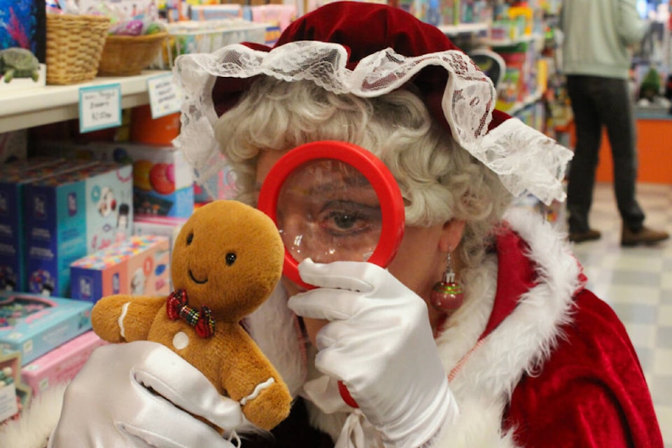 Mrs. Claus checks on the toys and gingerbread men at Kaboodles toy store. (Ella Matte/News Staff) Mrs. Claus checks on the toys and gingerbread men at Kaboodles toy store. (Ella Matte/News Staff) 