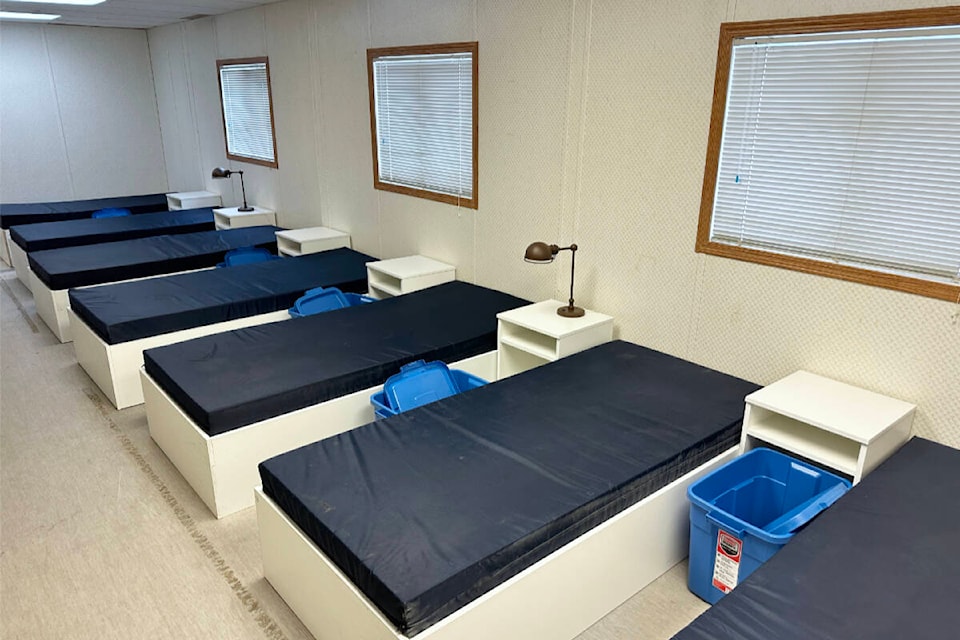 Temporary, on-loan beds (to be replaced) are set up in larger dorm-style rooms, and in smaller rooms accommodating two people, for the opening of the new Marshlands Shelter at 341 and 361 Fraser Ave. (near Churches Thrift Shop) which took place Tuesday, Dec. 12.  (Lachlan Labere/Salmon Arm Observer) 