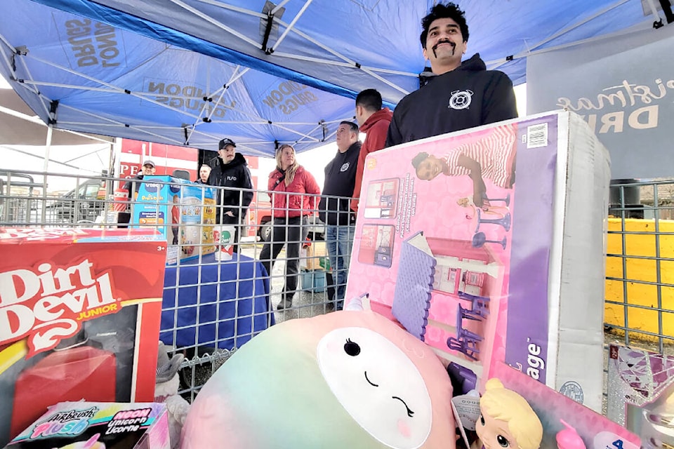  Township of 91ԭ firefighters were outside London Drugs in 91ԭ collecting toy donations for the 91ԭ Christmas Bureau on Thursday, Dec. 6. (Kyler Emerson/91ԭ Advance Times)  