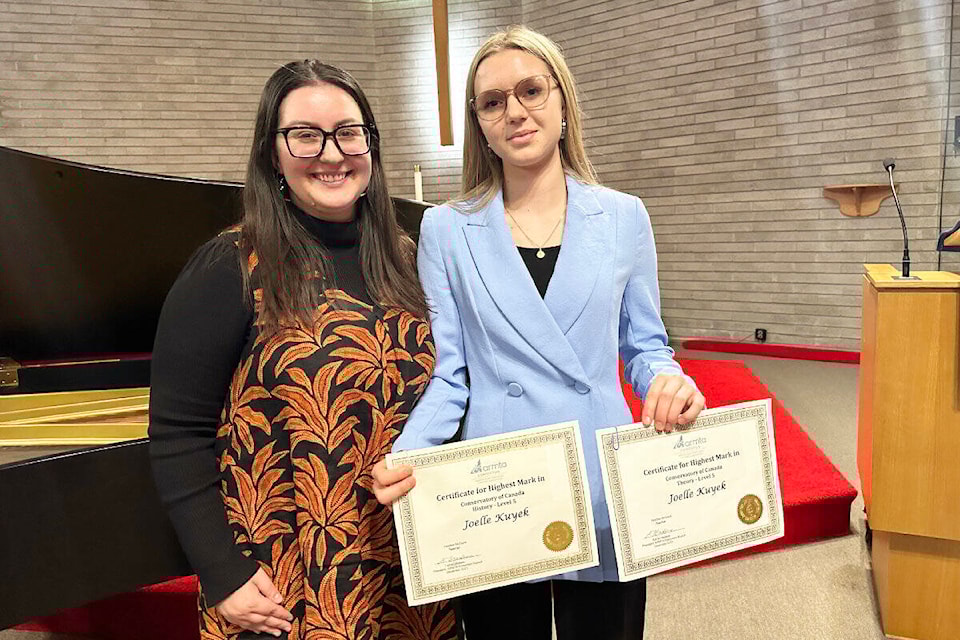Joelle Kuyek (R) poses with her music teacher, Heather McGuire. (Photo submitted) 