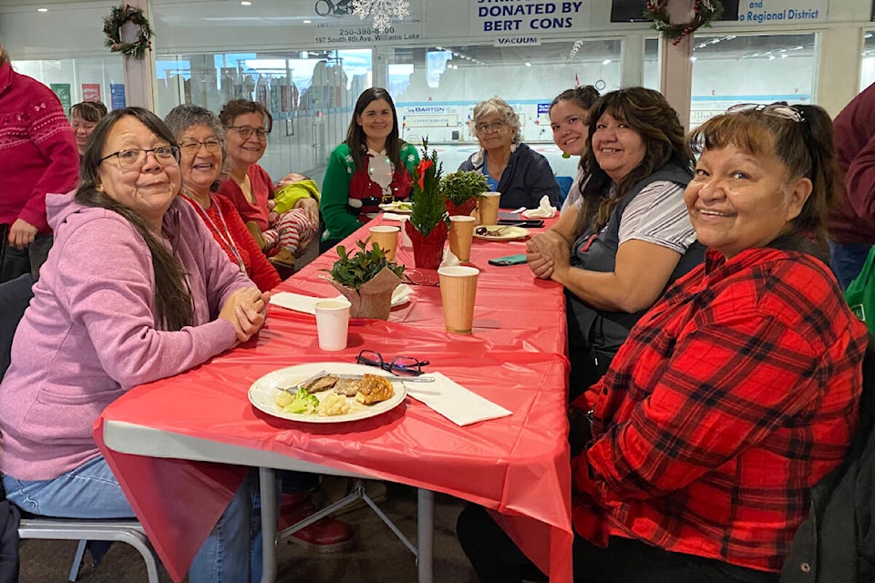 Three Corners Health Services Society hosts its annual open house lunch at the Williams Lake Curling Club on Dec. 8, 2023. Attendees were treated to delicious food and warm conversations. From left to right: Loretta Billy, Lillian Harry, Marie Camille, Cheryl Hope, Clara Camille, Ashley Camille, Martina Camille and Mercy Paul. (Kim Kimberlin photo - Efteen) 