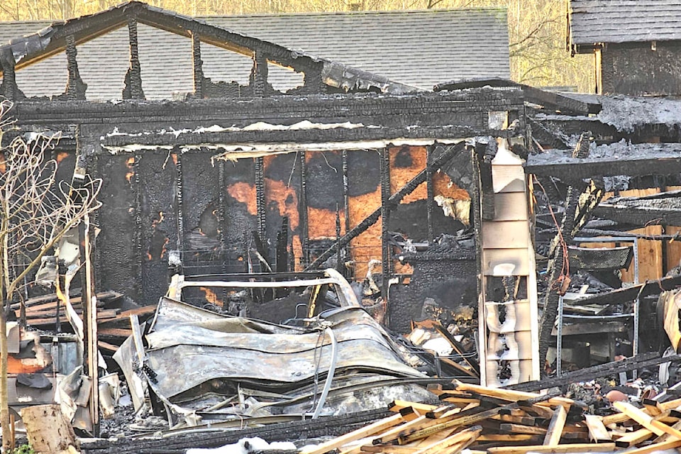  An outbuilding behind an occupied detached house burnt down in Aldergrove late Tuesday night, Dec. 19. (Dan Ferguson/)  