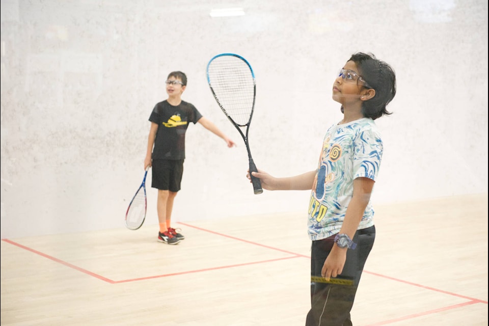 Players in the new champs division compete during the Christmas Squash Tournament on Dec. 15. (Patrick Egwu/Yukon News) 