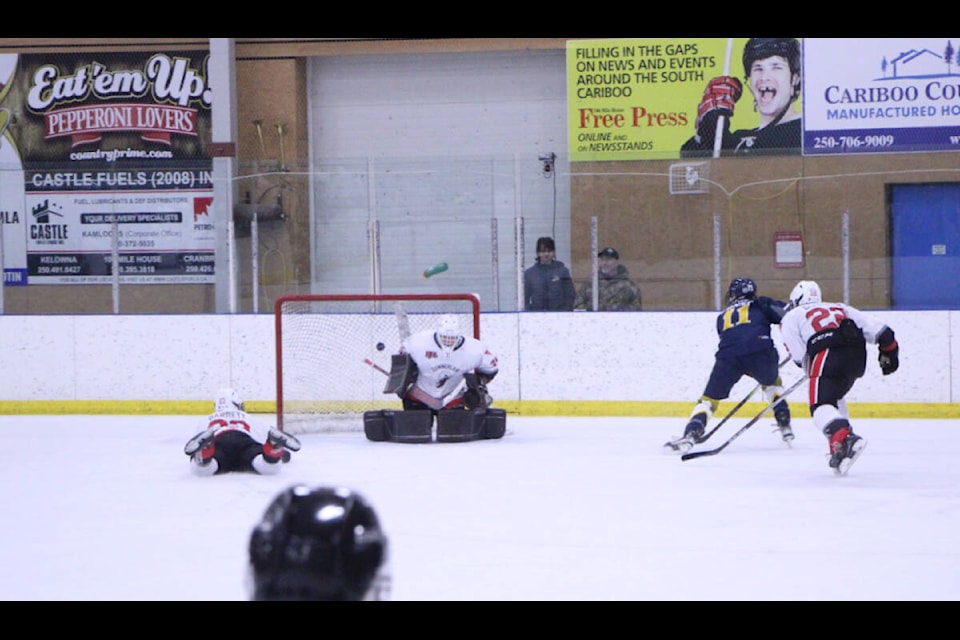 100 Mile House Wrangler defenceman Kaden Ernst scores in overtime against the Summerland Steam. (Patrick Davies photo - 100 Mile Free Press) 