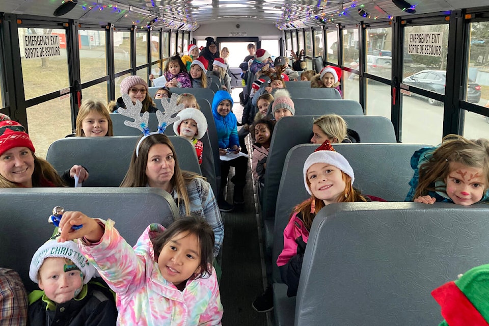Kindergarten and Grade 4/5 students from Cataline Elementary School made their way across Williams Lake singing Christmas carols as part of the school’s 12 Days of Christmas Giving initiative. Dec. 13, 2023. (Kim Kimberlin photo - Efteen) 
