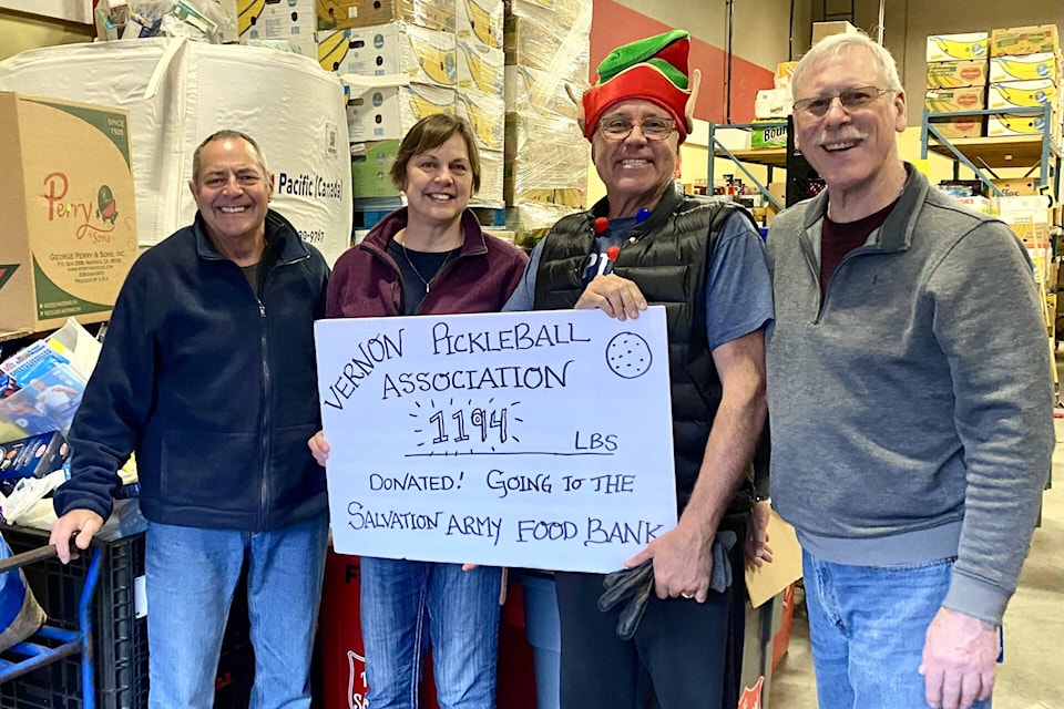 Left to right: Vernon Pickleball Association members Bob Tutush, Anne Longley, Marco Longley and Bruce Imrie celebrate raising nearly 1,200 pounds of food for the Salvation Army Food Bank throughout the month of December 2023. (Anne Longley photo) 