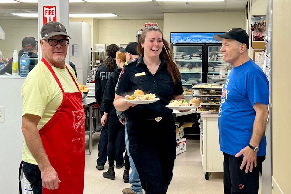 Volunteers are a big part of the success of the Salvation Army Christmas Dinner. (Angie Mindus photo - Efteen) 