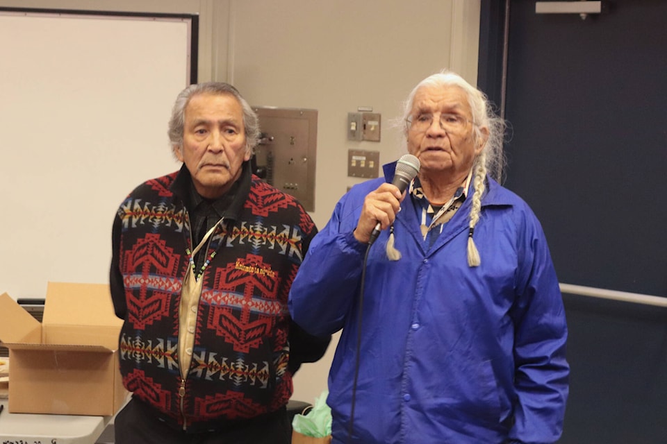 Syilx Elders Grouse Barnes (left) and Thomas Pierre spoke at a book launch at Okanagan College’s Vernon campus in early December 2023. The launch was for the book Elders 9, which contains hours of Elder recordings transcribed as a means to preserve the language. (Brendan Shykora - Morning Star) 