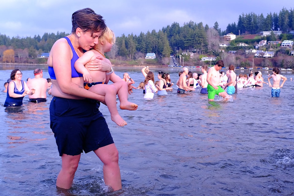 Hundreds of swimmers took Goose Spit Park’s waters by storm on New Year’s Day for the 47th edition of Comox’s Polar Bear Swim. (Olivier Laurin / Comox Valley Record) 