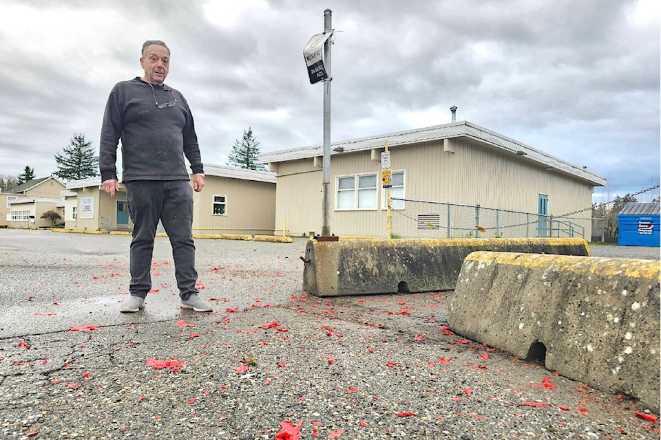 In the 10 years he’s lived near Langley’s Glenwood Elementary school, David Loiselle has come to expect the popping sounds of fireworks being set off in the school playground. This year, a blast rocked the neighbourhood, broke school windows, twisted a sign out of shape, scorched concrete dividers, and left bits of plastic scattered in the school parking lot. (Dan Ferguson/Langley Advance Times) 