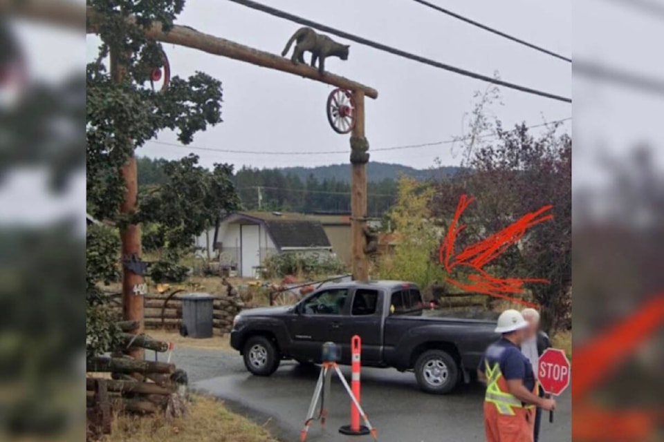 Rod Rimmer and his family’s $5,000 wooden bear sculpture was stolen off his property on Christmas day. (Courtesy of Dallas Rimmer on Facebook) 
