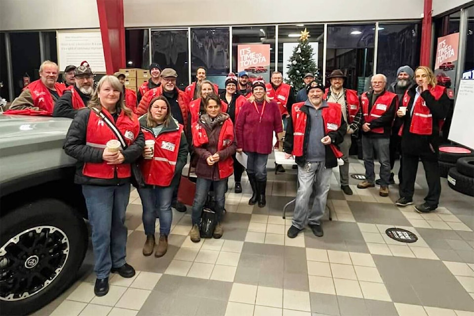 Operation Red Nose volunteers gather for a photo before the phones start ringing for rides home over the holidays in December 2023. (Photo submitted) 