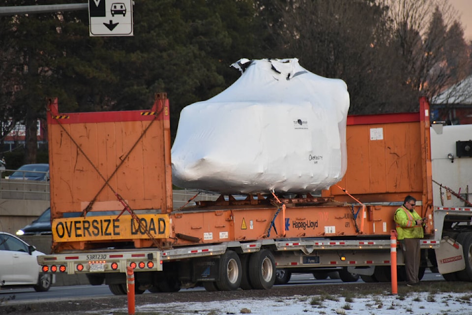 BC Highway Patrol were called to investigate after a truck carrying a shrink-wrapped helicopter fuselage reportedly struck an overpass in Burnaby on Monday, Jan. 15, 2023. (Credit: Curtis Kreklau) 