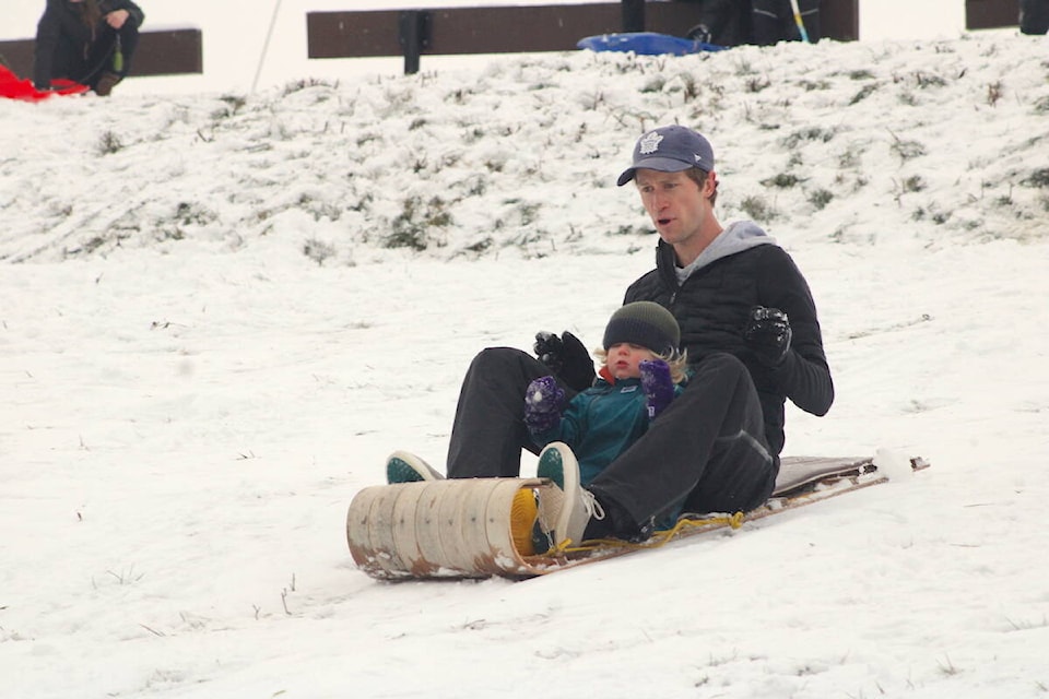 Sledders hit the slopes at Beacon Hill Park on Jan. 17 after Victoria was hit by a snowstorm. (Jake Romphf/News Staff) 