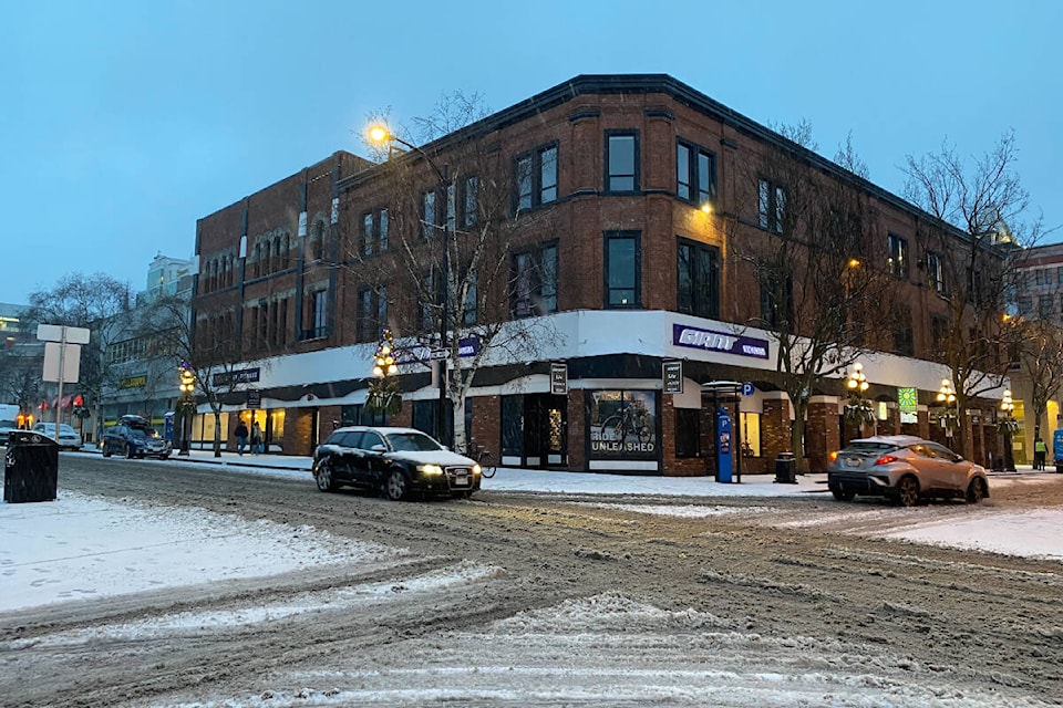 City streets remain slick as the sun rises in Victoria on Wednesday (Jan. 17) with snow and ice expected for much of the day. (Lauren Collins/Black Press) 