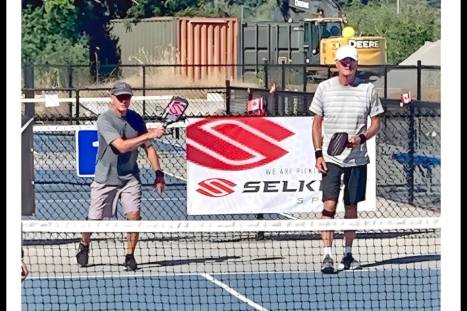 Langley pickleball player Bill Mercer (on left) is hoping to convince Township council to open up more spaces for the rapidly-growing sport. (Special to Langley Advance Times) 