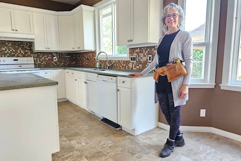 Ronel Dryer of the Nickel Brothers heavy lifting and transportation company showed off the kitchen of this 2003-built house in Aldergrove at 3385 270th St. which is facing demolition if it isn’t relocated. (91ԭ Advance Times files) 