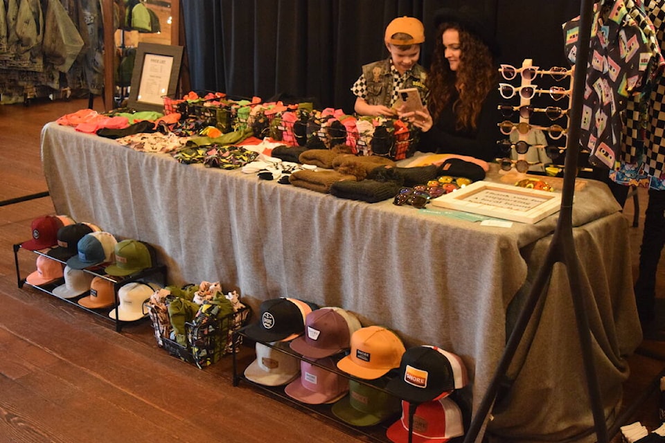 The Luxe Fashion Market features new and used high end fashion and accessories, vintage items, and locally handmade goods. The market was held at Laurel Packinghouse in  on Jan. 28, 2024. (Brittany Webster/Capital News) 