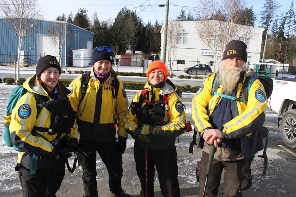 A search and rescue team prepares to go out on a training mission. These teams will always search in groups of two or more. (Thomas Eley/ News Staff) 