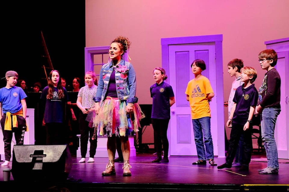 Nelson singer and actor Rachel DeShon, shown here with some of the cast members of Anything Is Possible, a children’s opera she produced at the Capitol Theatre on Feb. 1. Photo: Bill Metcalfe 