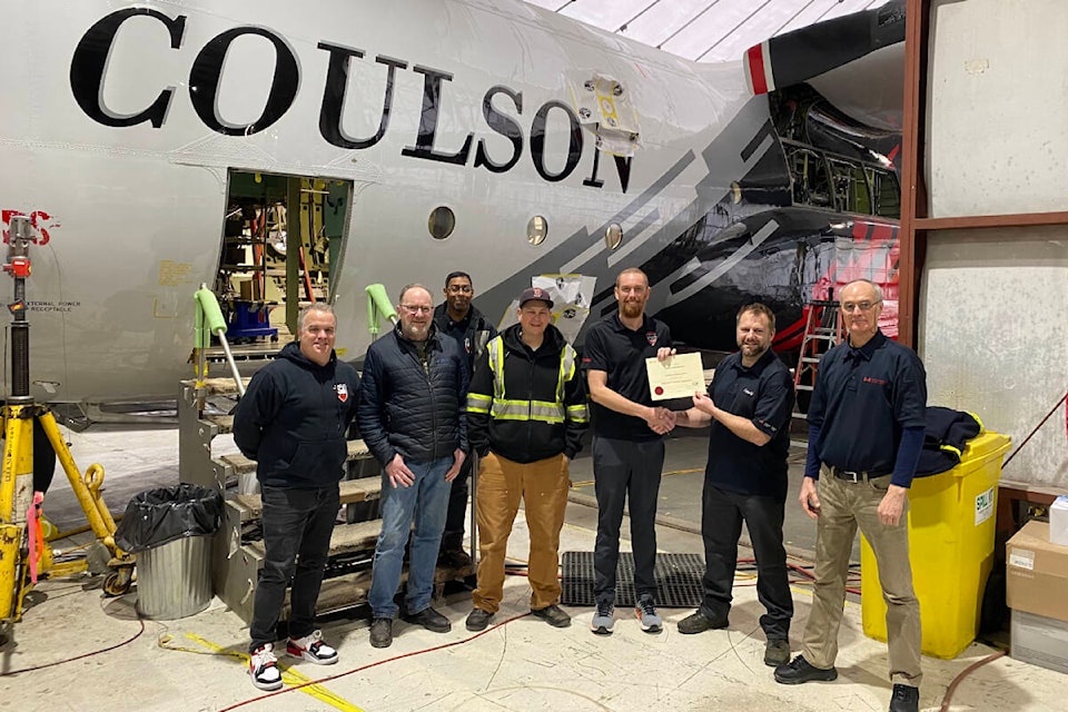 Britton Coulson, third from right, accepts an Approved Training Organization certificate on behalf of Coulson Group. The Port Alberni-based company is the only ATO in Canada that is not a dedicated school. (PHOTO COURTESY COULSON GROUP) 