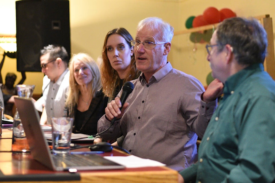 Scott Smith, director of development services and deputy CAO for the City of Port Alberni, answers a question during the AV Transition Town panel Wednesday, Jan. 24, 2024 at Char’s Landing. To his left is Tuenesha Evertse, a planner with Westplan Consulting Group who was representing Pacific Mayfair Estates on the panel. (SUSAN QUINN/ Alberni Valley News) 