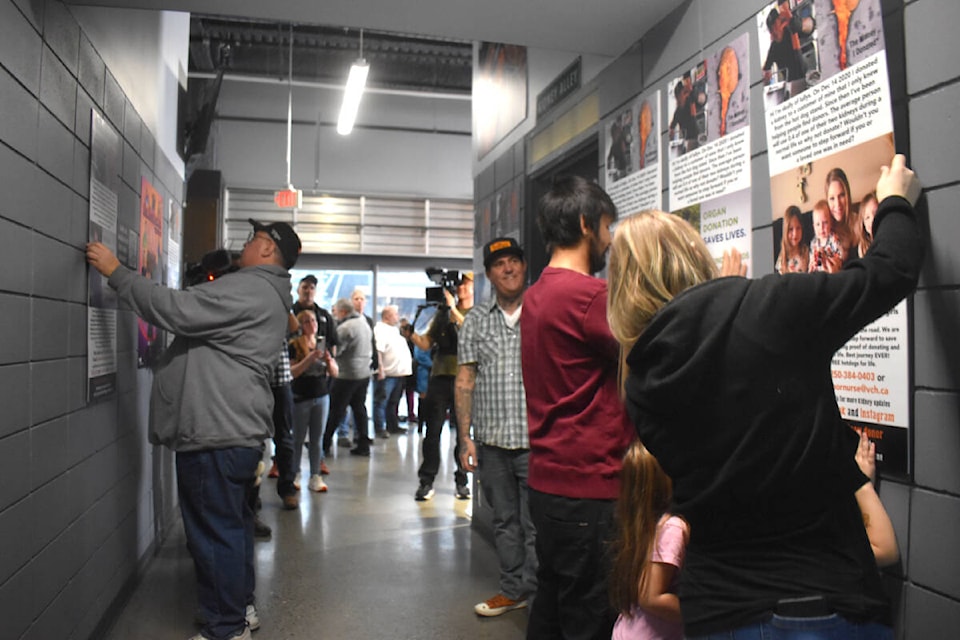 The three hopeful recipients place their posters on Kidney Alley. (Ben Lypka/Abbotsford News) 