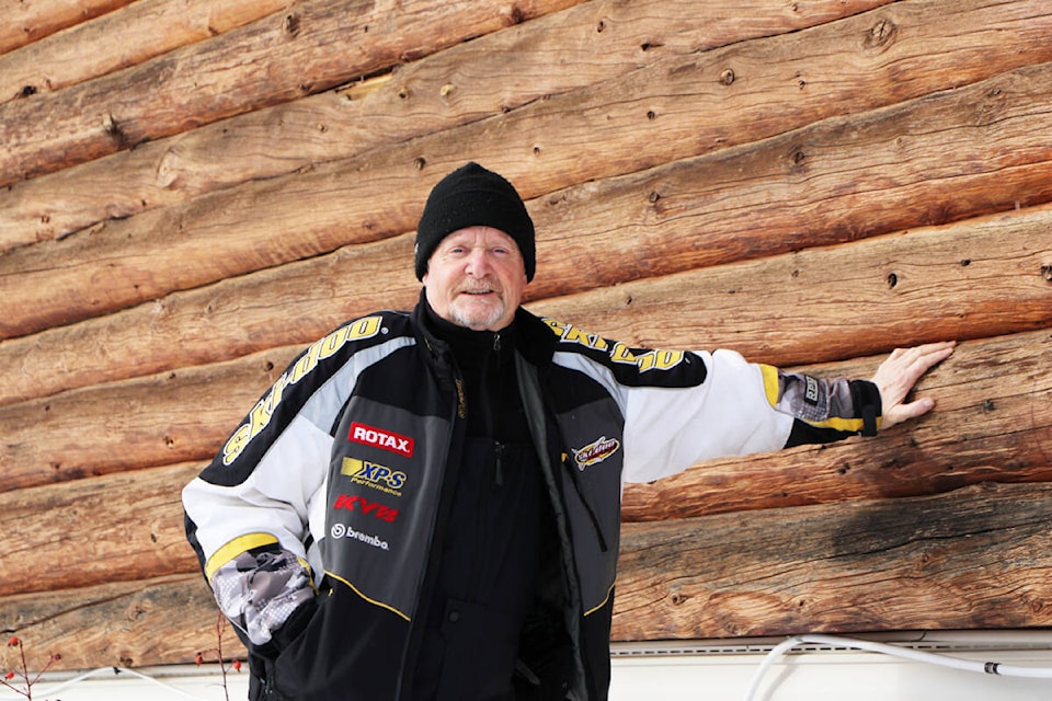 Rick Kyllo, president of the 100 Mile House Snowmobile Club, hopes to raise up to $25,000 to refinish the log home exterior of his club’s clubhouse. The logs were originally placed 50 years ago and are in need of a makeover. (Patrick Davies photo - simplymastery) 