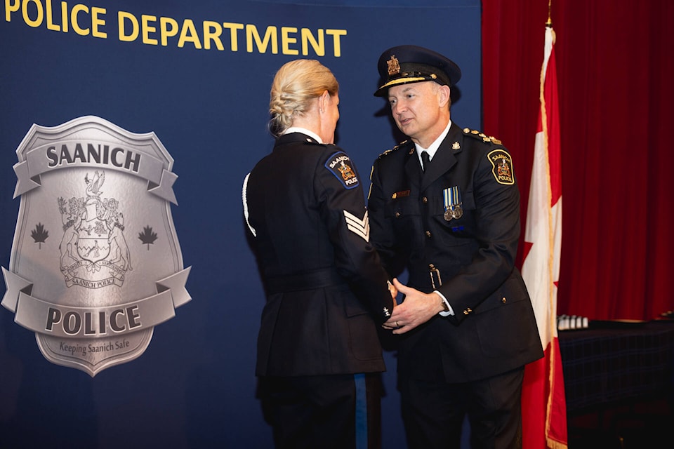 Saanich Police Chief Dean Duthie recognizes 86 officers and 26 work units in a Jan. 30 ceremony to acknowledge their actions and contributions in the wake of a brazen armed robber on June 28, 2022. (Courtesy Saanich Police Department) 