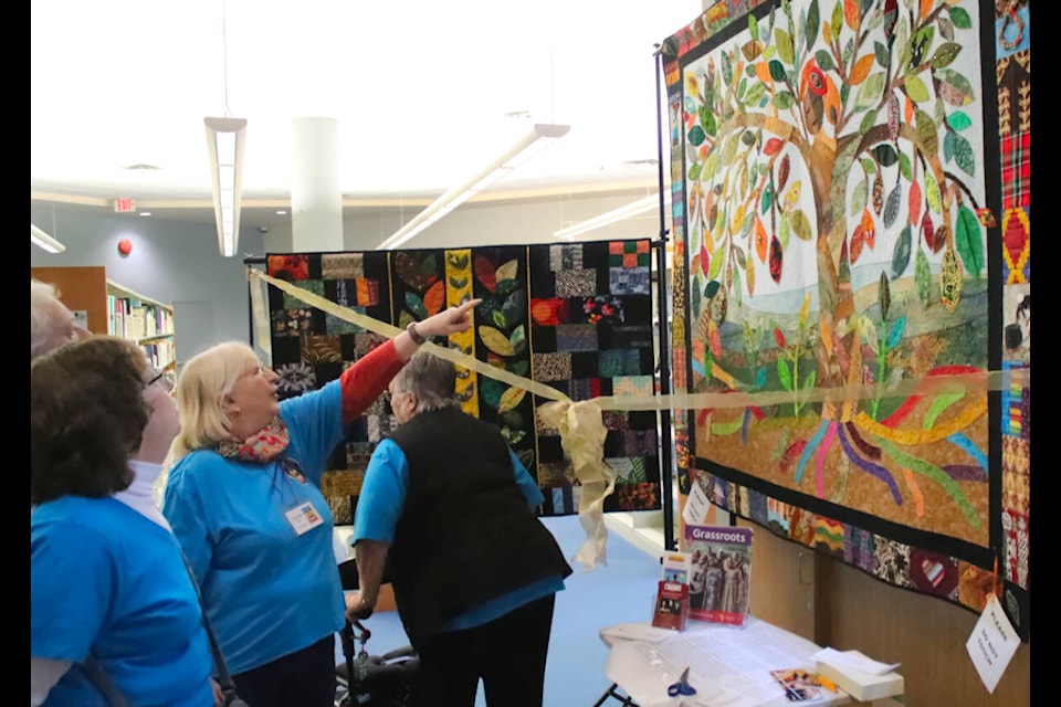 Golden Ears Gogos held a grand unveiling ceremony at the Maple Ridge Public Library on Feb. 2 to promote the 20th-anniversary solidarity quilt made by Grandmothers to Grandmothers Campaign members. (Brandon Tucker/The News) 