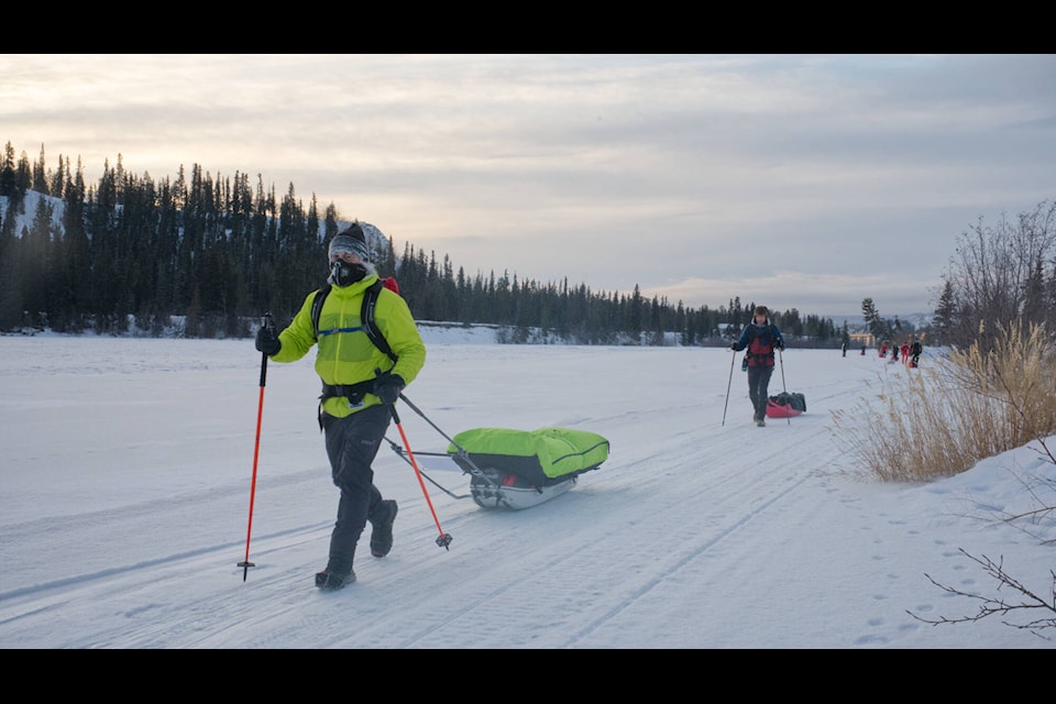 Yukon Arctic Ultra racers depart Whitehorse on the frozen Yukon River in 2024. (Jim Elliot/Yukon News) 