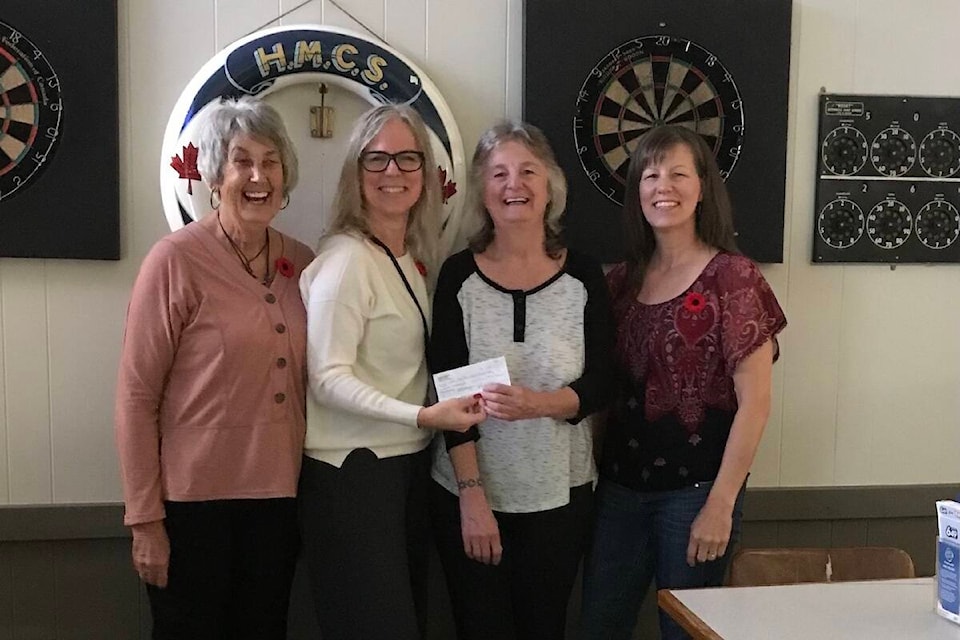 The Youbou Community Music Fest had a successful second concert last November with the Tom Petty tribute band Maryjane’s Last Dance. Youbou Community Music Fest members Karen Dunnigan (left) Heidi Kulzer and Vicki Harvey (far right) donated a portion of the night’s proceeds to Lake Cowichan Legion manager Teresa McGougan with a cheque for $710. (Courtesy of Heidi Kulzer) 