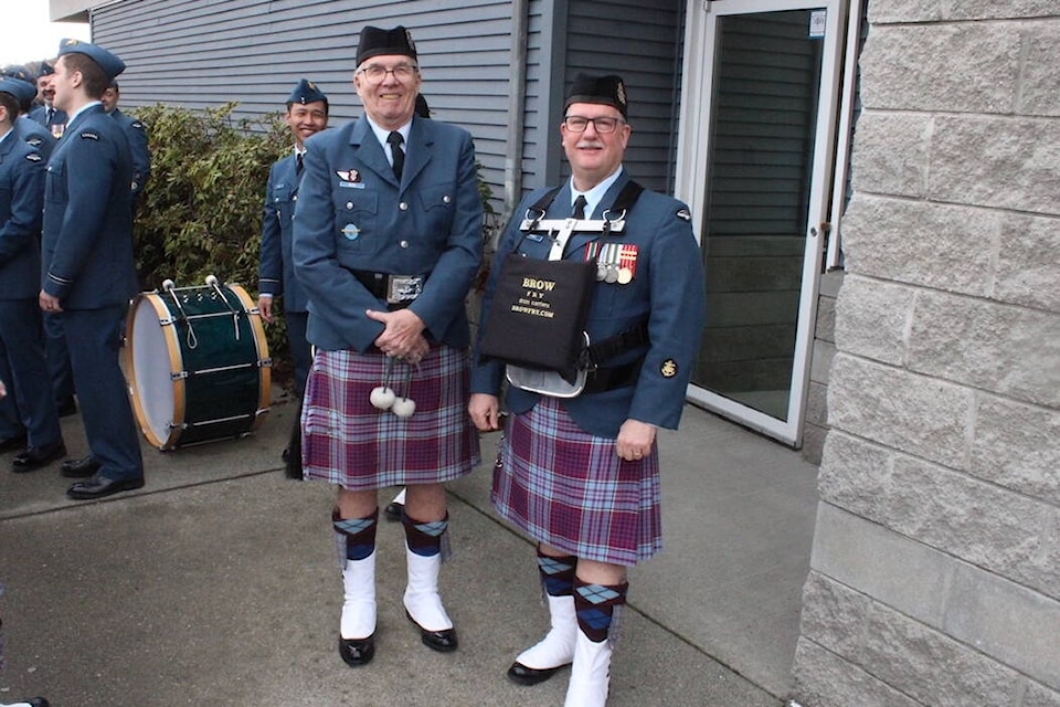 Andy House on left and Eric Kenney of the 443 Maritime Helicopter Squadron band preparing for the Freedom of the Town of Sidney parade. (Mark Page/News Staff) 