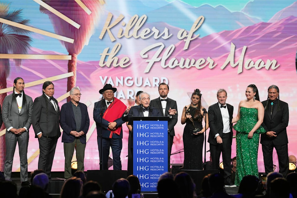 35th Annual Palm Springs International Film Festival Awards Gala - Show Tatanka Means, from left, William Belleau, Robert De Niro, Yancey Red Corn, Martin Scorsese, Leonardo DiCaprio, Lawren “Lulu” Michele Goodfox, Bradley Thomas, Lily Gladstone, and Talee Redcornat accept the vanguard award for “Killers of the Flower Moon” the 35th annual Palm Springs International Film Festival Awards Gala on Thursday, Jan. 4, 2024, in Palm Springs, Calif. (AP Photo/Chris Pizzello) 