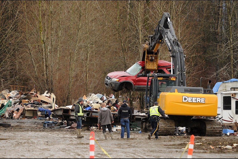 A vehicle is removed at the encampment on Island 22 on Thursday, Feb. 1, 2024. (Jenna Hauck/ Chilliwack Progress file) 