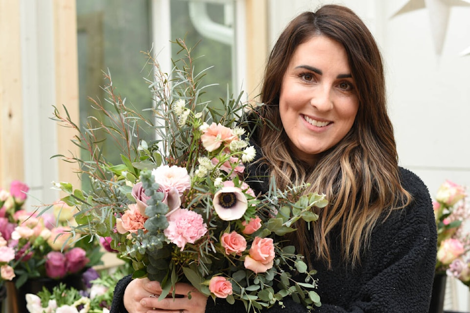Alixe Diewold of Michigan Lane Bloom Co. creates bouquets of flowers for Valentines’ Day using a softer, more traditional palette. (SUSIE QUINN/ Alberni Valley News) 