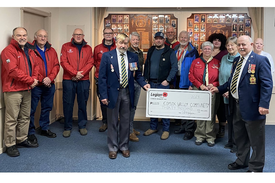 In this photo, Bob Hodgson, treasurer (left side of cheque) and Gerry Mailet, president of Comox Legion present representatives from the CV Marine Rescue Society ($1,000), VI Society for Adaptive Snowsports ($1,500), Food Bank ($2,500), Red Cross ($500), Scouts ($1,000), Therapeutic Riding Association ($1,000), MARS ($750), and the Comox Valley Hospice Society Hospice ($1,500) with funds raised in 2023. 