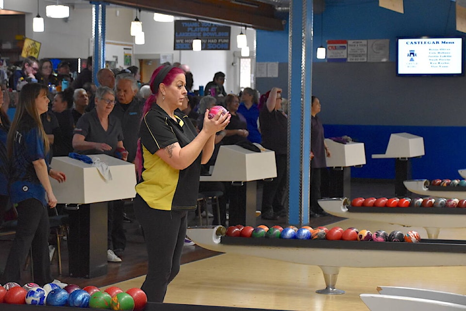 With colour coordinated flair, Lumby’s Tawnya Calder plots her path to the pins at the Interiors tournament at Lakeside Bowling on Saturday, Feb. 10. (Heather Black-Salmon Arm Observer) 