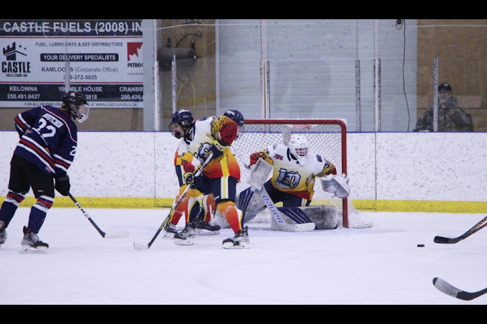 100 Mile House Wrangler goalie Owen Pettipas defends his net against the Sicamous Eagles on Wednesday, Feb. 7. (Patrick Davies photo - 100 Mile Free Press) 
