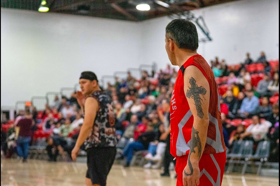 Masters - Prince Rupert (in black) versus Lax Kw’alaams (in red) Feb. 10, 2024. (Kara Wilson/Kids4Cameras, special to The Northern View) 