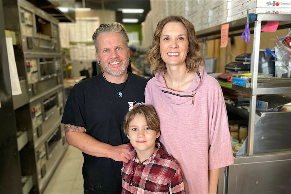 Jason and Amber Akeson, with their son Nova, at Red Tomato Pies in Williams Lake Feb. 2023. The couple opened their pizza business in 2010. (Kim Kimberlin photo -Efteen) 