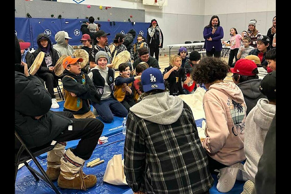 Participants at the first Tlegohli Youth Handgames Tournament in Norman Wells compete in the Mackenzie Mountain School gymnasium. Photo courtesy of Lynda MacCauley 
