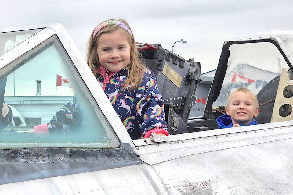 Youngsters tried out a pilot’s seats. More than 2,500 visitors, a record, attended the Canadian Museum of Flight on Family Day. (Dan Ferguson/) 